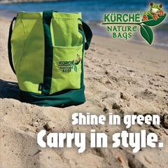 Seagrass Green KÜRCHE canvas tote beach bag lifestyle photo, reusable carryall tote on sand